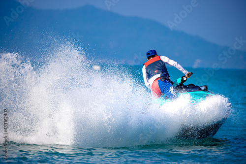 A man driving a jet ski