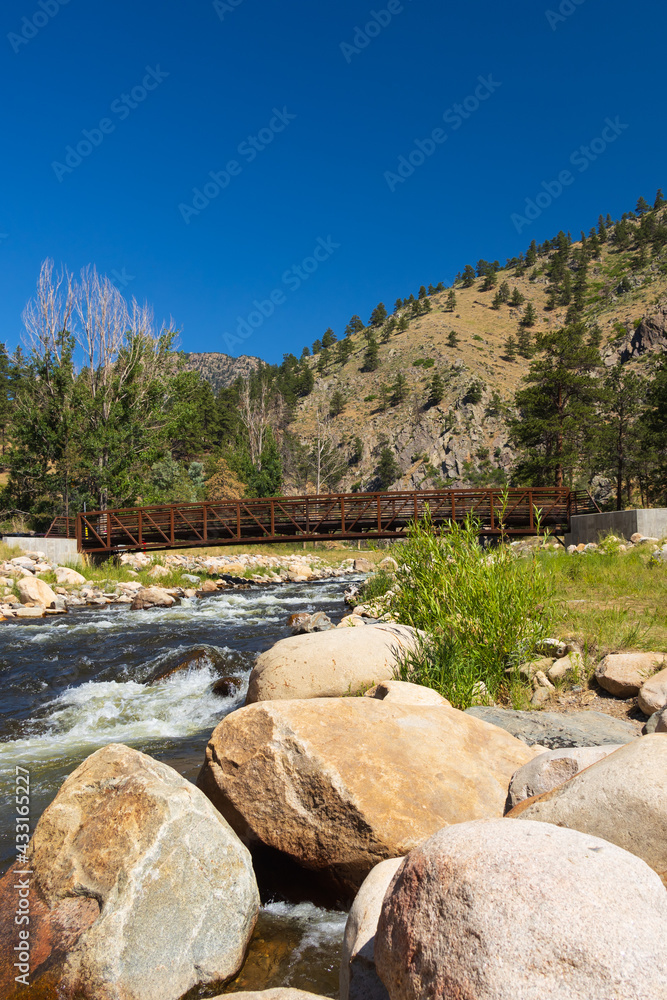 Metal bridge spanning over the Big Thompson River, Colorado