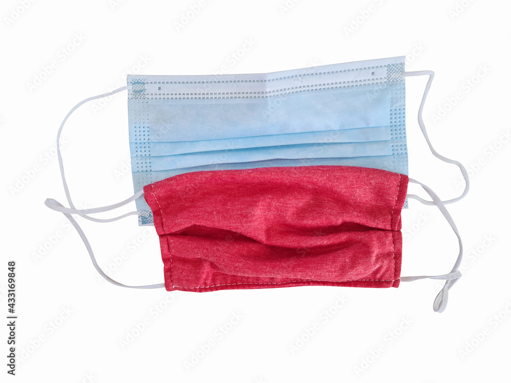 Wear two protective masks at the same time. On a isolated white background Wear two protective masks at the same time. On a isolated white background