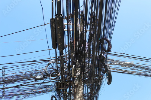 Wallpaper Mural Confusing of telephone wires and internet wires in the city Torontodigital.ca