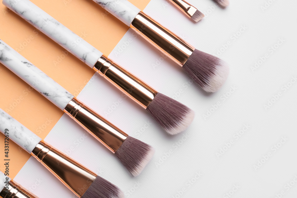 Set of makeup brushes on color background Set of makeup brushes on color background