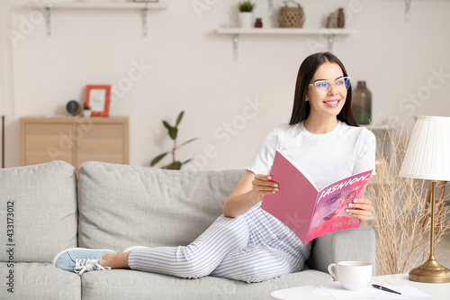 Young woman wearing glasses...