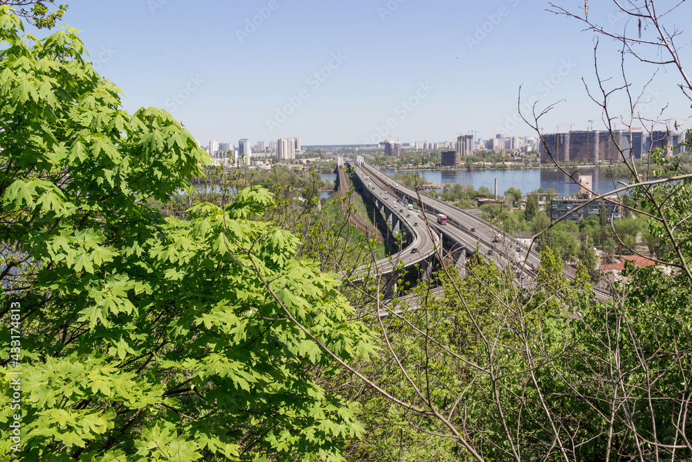 City landscape. Bridge over river. Construction of high-rise buildings City landscape. Bridge over river. Construction of high-rise buildings