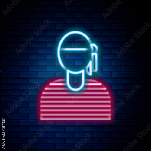Glowing neon line Sailor captain icon isolated on brick wall background. Colorful outline concept. Vector