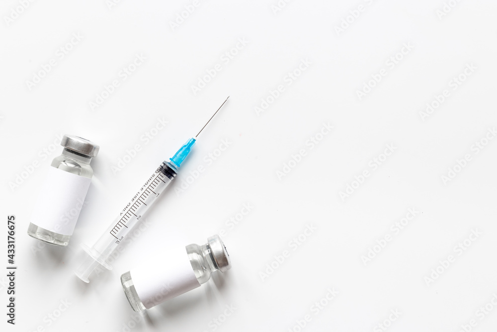 Inject the vaccine. Coronavirus vaccine ampoules with syringe Inject the vaccine. Coronavirus vaccine ampoules with syringe