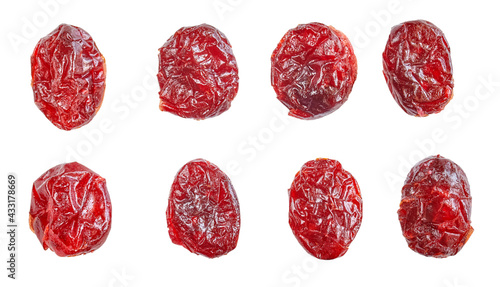Dried whole round cranberries isolated on white background, selective focus.