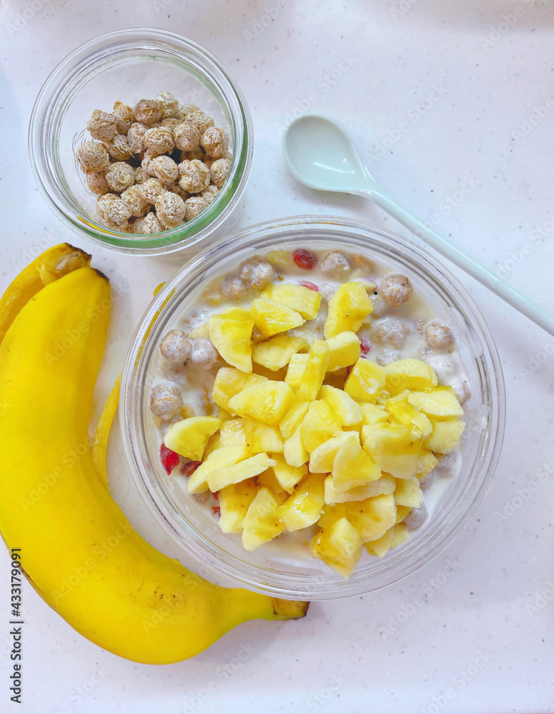 healthy and delicious breakfast consisting of banana, cereal muesli with milk and goji berries. healthy and delicious breakfast consisting of banana, cereal muesli with milk and goji berries.
