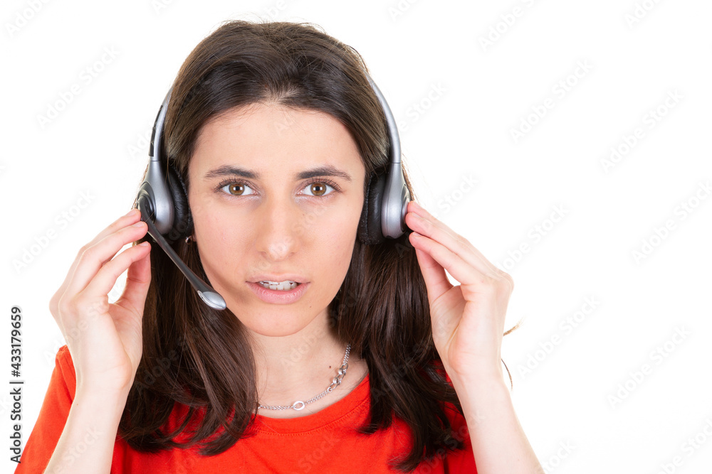 Beautiful happy call center consultant woman with headset phone in white background aside copy space Beautiful happy call center consultant woman with headset phone in white background aside copy space