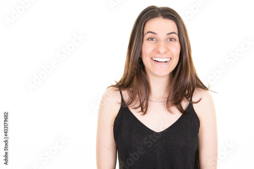 woman surprised portrait young pretty cheerful happy woman smiling laughing looking at camera over white background copy space