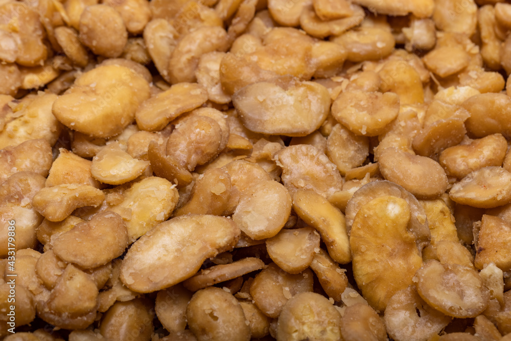 Roasted and salted fava beans for a healthy vegan and vegetarian diet snack. High in protein, vitamins, dietary fibre and nutrients Roasted and salted fava beans for a healthy vegan and vegetarian diet snack. High in protein, vitamins, dietary fibre and nutrients