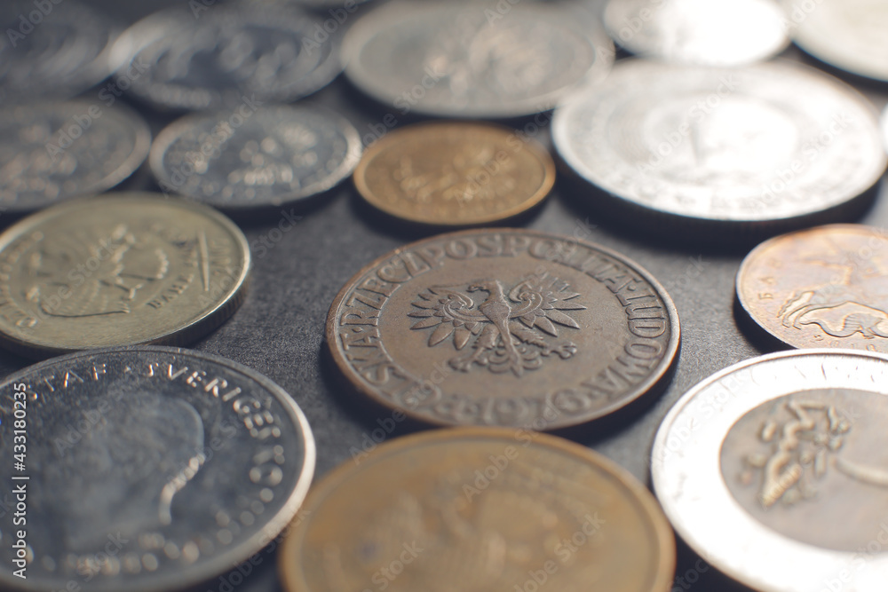 Many coins on a black background. Close up Many coins on a black background. Close up
