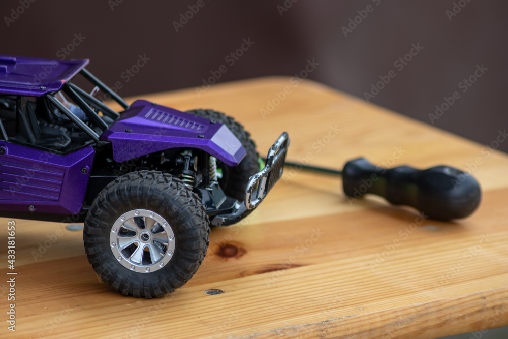 Foto de Off road rc car with remote control and battery ready to race