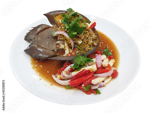 Spicy Horseshoe Crab Egg Salad (Yum Kai Mang Da). Spicy steam horseshoe crab Salad, favorite delicious hot and spicy seafood menu in Thailand