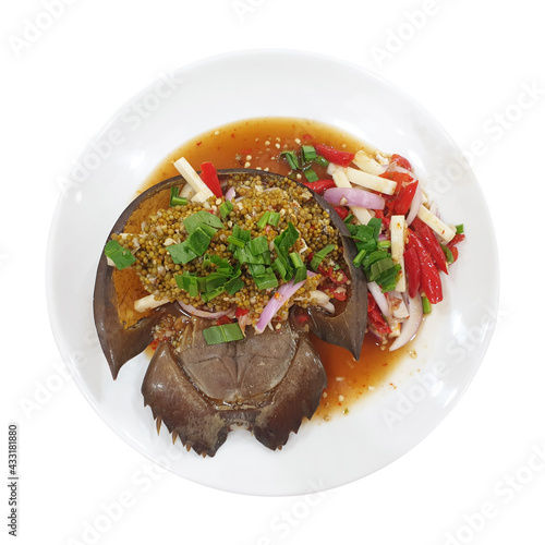Spicy Horseshoe Crab Egg Salad (Yum Kai Mang Da). Spicy steam horseshoe crab Salad, favorite delicious hot and spicy seafood menu in Thailand
