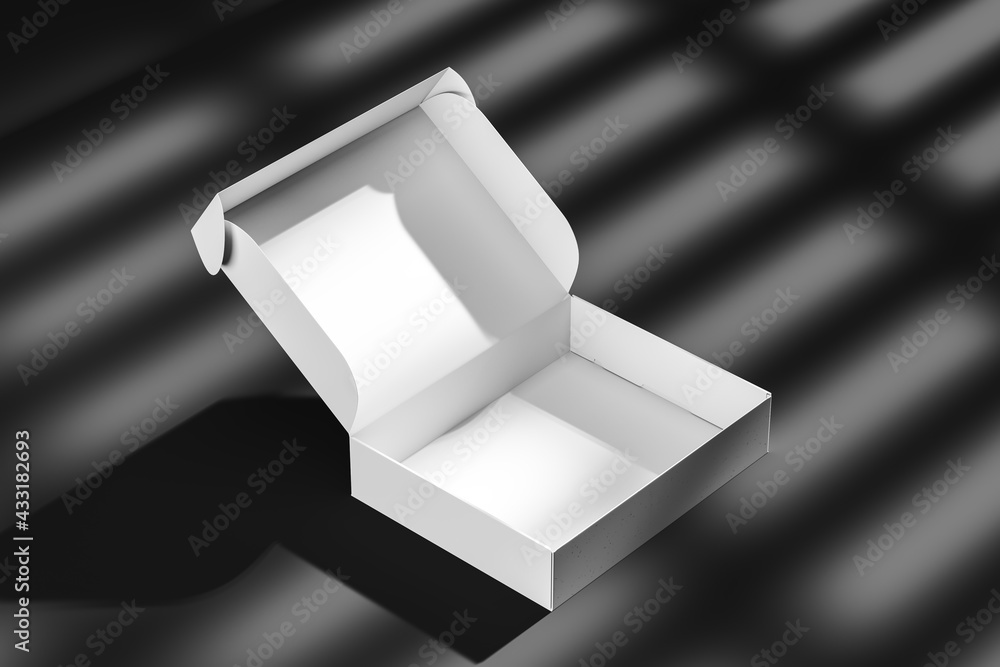 Opened white cardboard box on a black background with a shadow ...