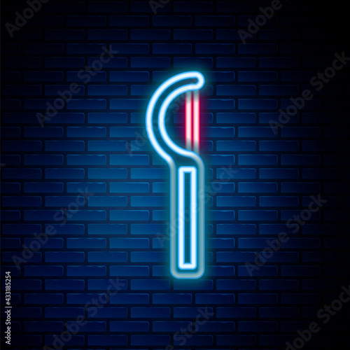 Glowing neon line Dental floss icon isolated on brick wall background. Colorful outline concept. Vector