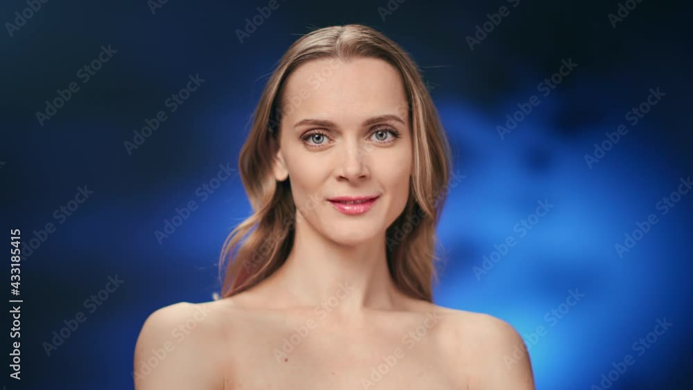 Medium closeup portrait beautiful blonde woman with perfect moisturizing skin and natural beauty Medium closeup portrait beautiful blonde woman with perfect moisturizing skin and natural beauty