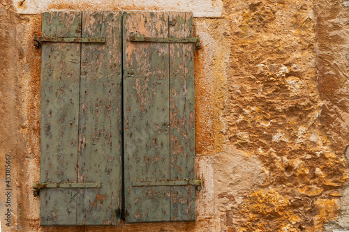 Facade window of an old European Mediterranean town. Close-up. Texture. © Oleksandr Baranov