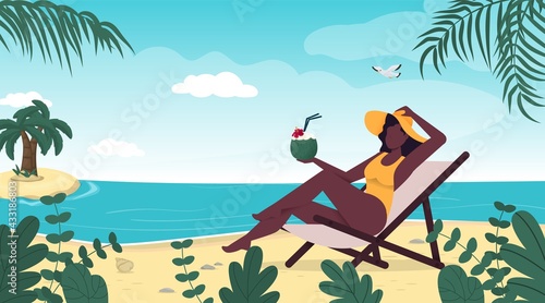 Woman in swimsuit summer hat sitting on tropical beach. Blue sea island in the background. Summer vacation concept. Girl in bikini travel sea. Tropical island paradise. Palm leaves, ocean wave seaside