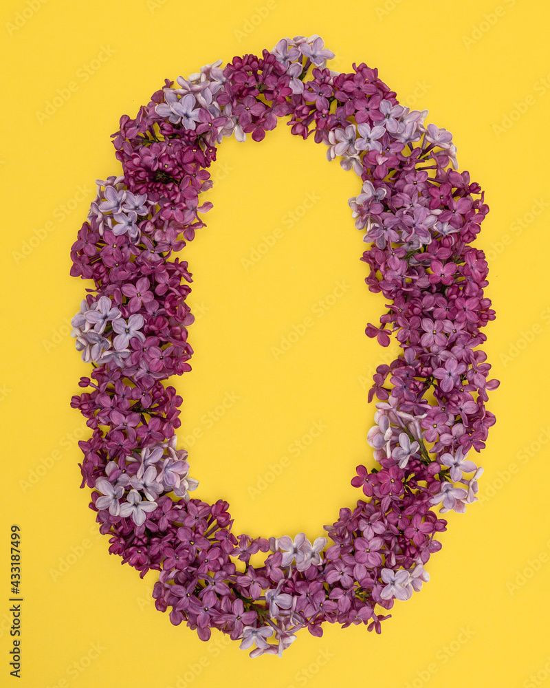The letter D is lined with lilac flowers on a yellow background. For lettering, composing words.