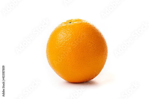Foto One orange fruit isolated on white background.