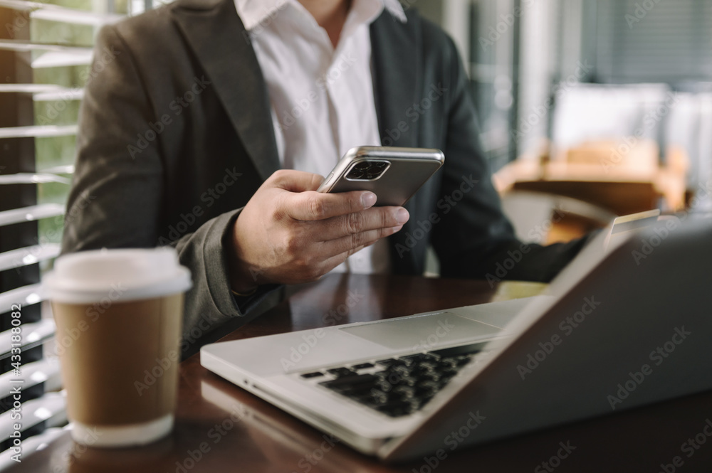 businessman using on smartphone and tablet as concep businessman using on smartphone and tablet as concep
