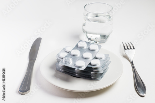 eat pills in a saucer