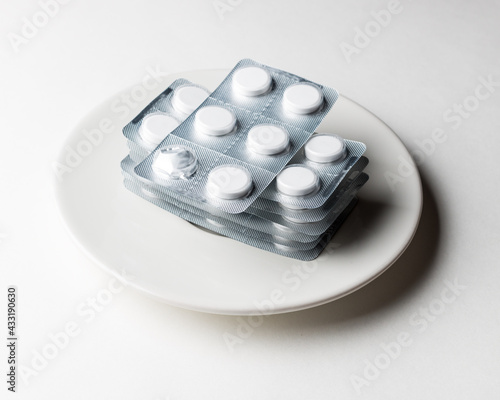  eat pills in a saucer