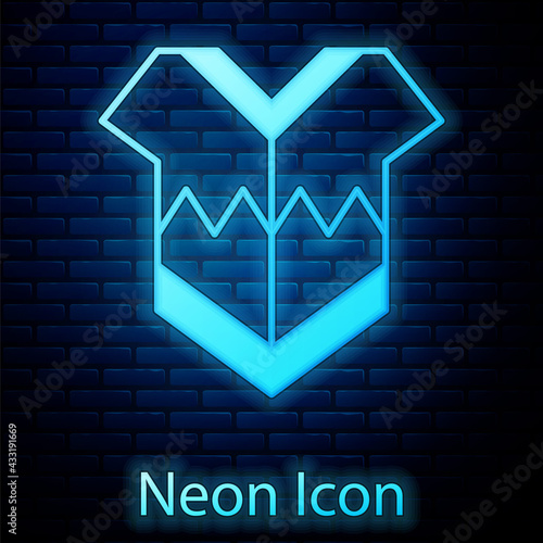 Glowing neon Traditional mexican poncho clothing icon isolated on brick wall background. Vector