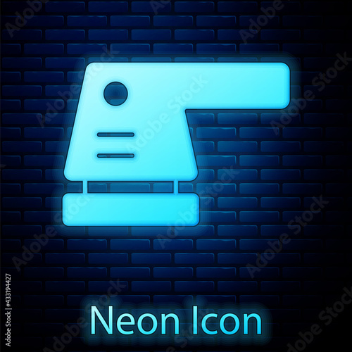 Glowing neon Electric sander icon isolated on brick wall background. Orbital sander. For floor and wooden planks sanding sandpaper. Vector