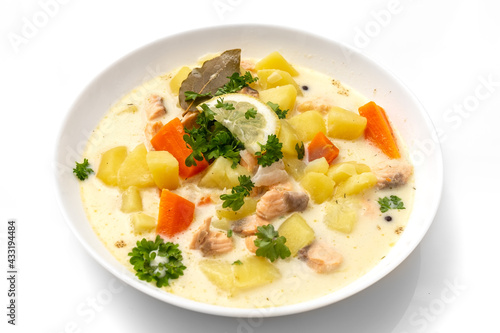 Traditional Finnish Salmon Soup. White background. Healthy food.