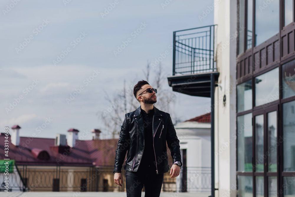 Attractive young hipster man with stylish hairstyle Attractive young hipster man with stylish hairstyle