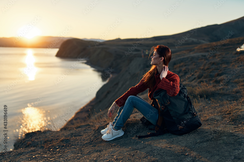 woman hiker backpack rocky mountains travel fresh air sun woman hiker backpack rocky mountains travel fresh air sun