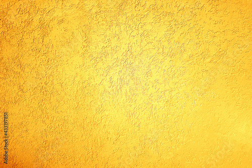 Plastered wall texture, orange tone colored background