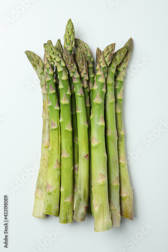 Bunch of fresh green asparagus on white background