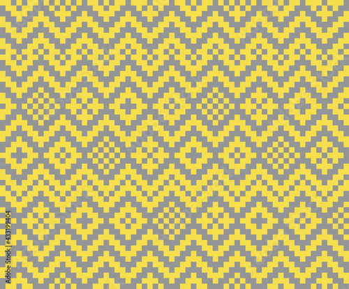 Colors of year 2021 illuminating yellow and ultimate gray geometric seamless pattern with pixel art rhombus. Abstract diamond vector background. Simple vector illustration