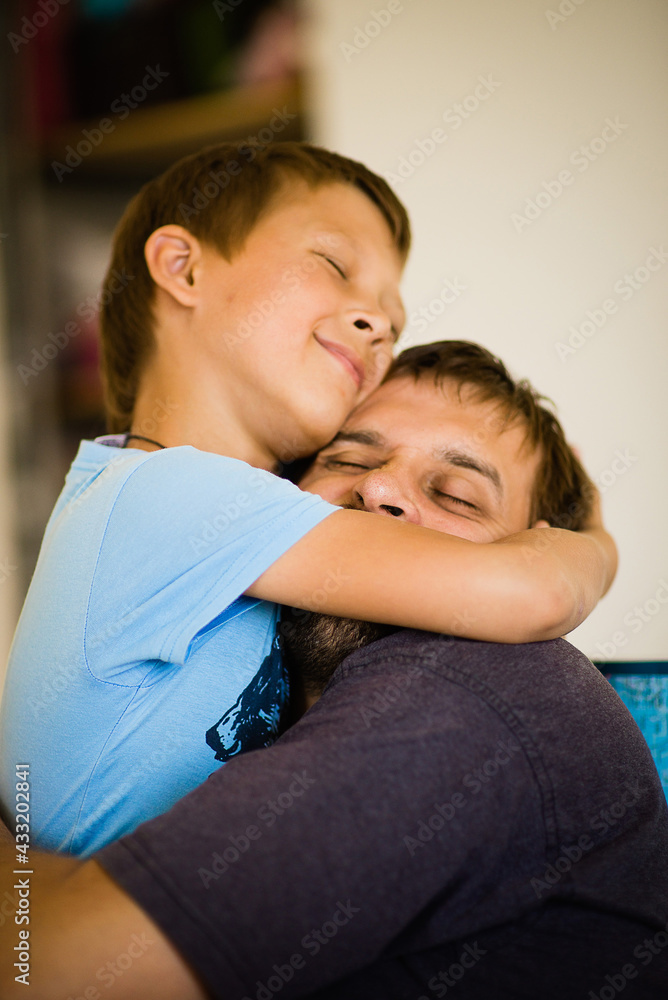 son hugs dad son loves dad happy family family values selective focus