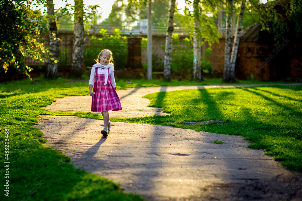 happy girl in purple dress, outdoor walks happy childhood selective focus