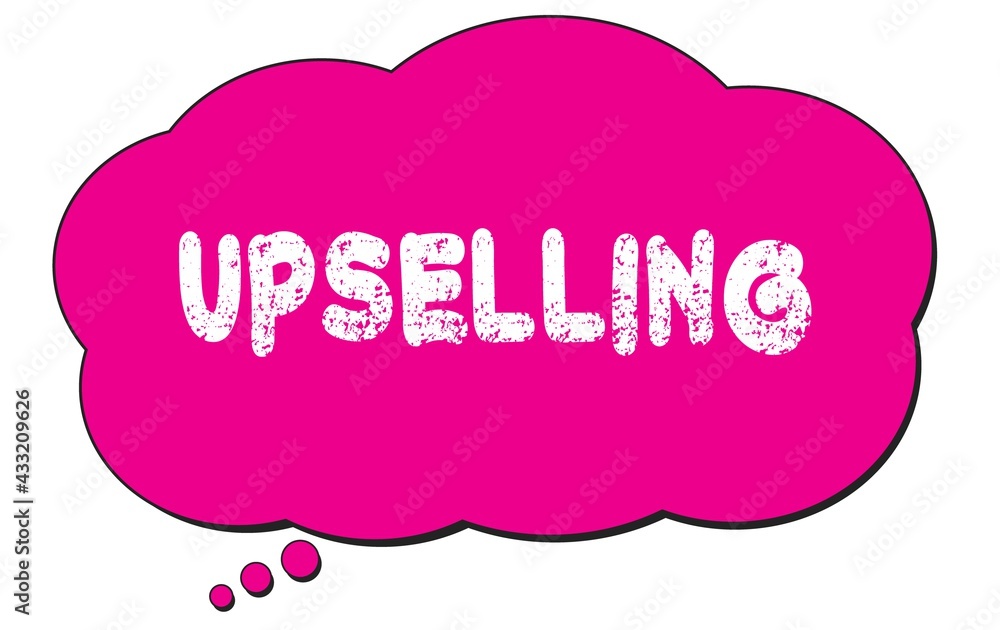 UPSELLING text written on a pink thought bubble. UPSELLING text written on a pink thought bubble.