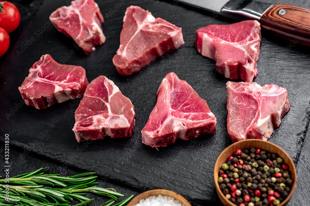 mini raw
Beef T-Bone steak on stone background