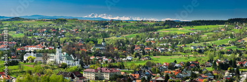 Wide Panoramic View over Monastery and Cityscape of Tuchow,Poland with tatra Mountains Range in Background © marcin jucha