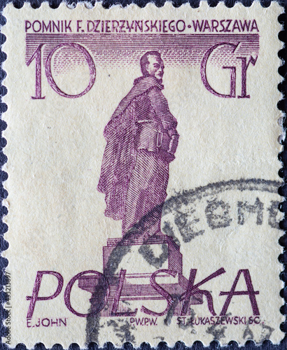 POLAND-CIRCA 1955 : A post stamp printed in Poland showing a Warsaw figure: feliks e. dzerzhinski, warsaw monument, polish revolutionary photo