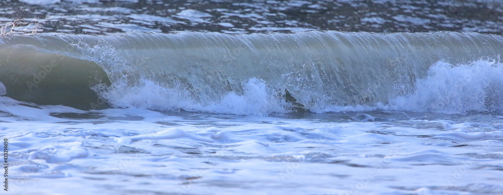 Waves breaking on the shore at Flamborough beach, East Yorkshire, UK. Waves breaking on the shore at Flamborough beach, East Yorkshire, UK.