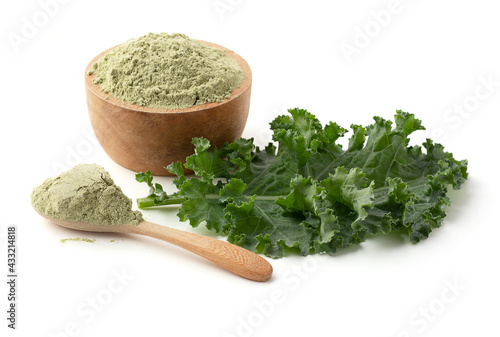 kale powder on wooden spoon, fresh kale and powder isolated on a white background, kale powder on wooden bowl, super food.