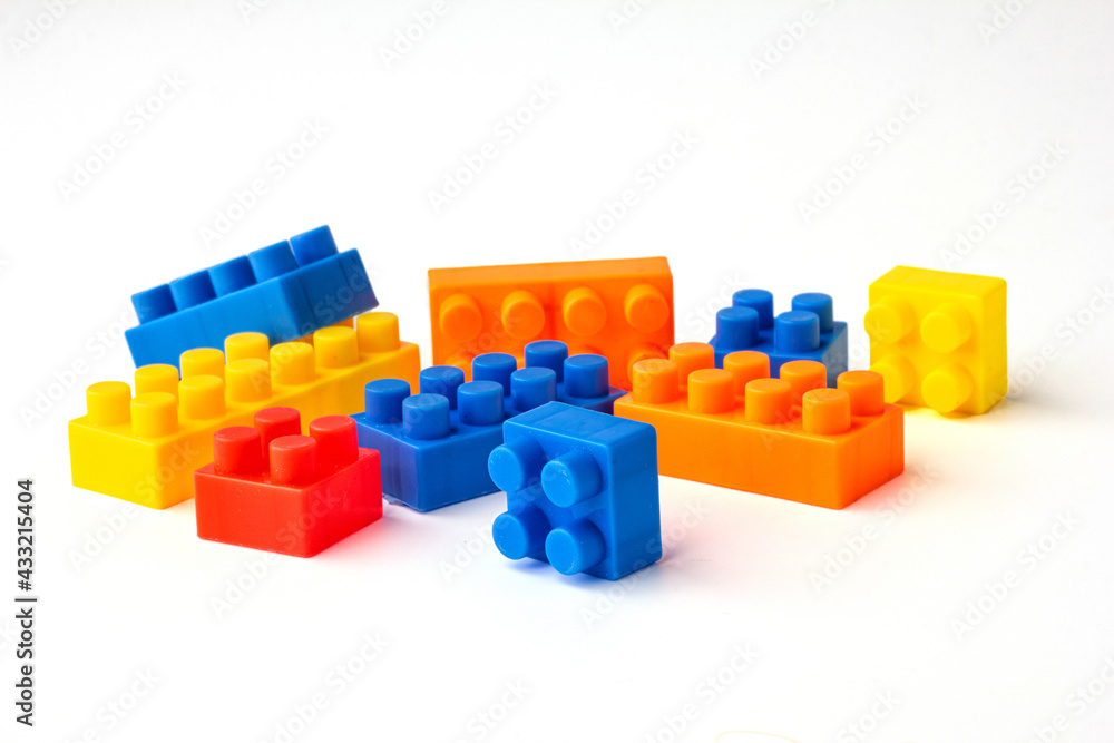 Many color square puzzle toys isolated on a white background. Many color square puzzle toys isolated on a white background.