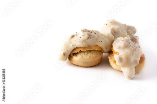 Traditional American biscuits and gravy for breakfast isolated on white background. Copy space