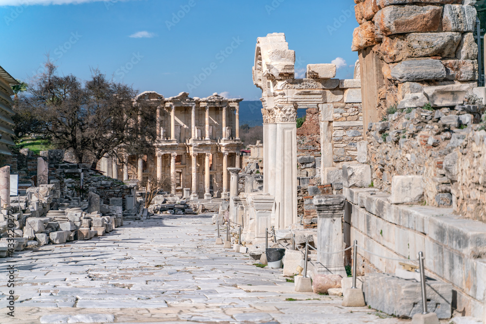 Celsus Library in Ephesus in Selcuk (Izmir), Turkey. Marble statue is Sophia, Goddess of Wisdom, at the Celcus Library at Ephesus, Turkey. The ruins of the ancient antique city. Celsus Library in Ephesus in Selcuk (Izmir), Turkey. Marble statue is Sophia, Goddess of Wisdom, at the Celcus Library at Ephesus, Turkey. The ruins of the ancient antique city.