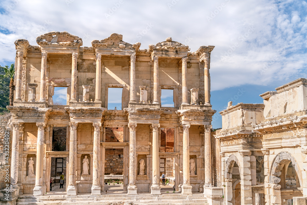 Celsus Library in Ephesus in Selcuk (Izmir), Turkey. Marble statue is Sophia, Goddess of Wisdom, at the Celcus Library at Ephesus, Turkey. The ruins of the ancient antique city.