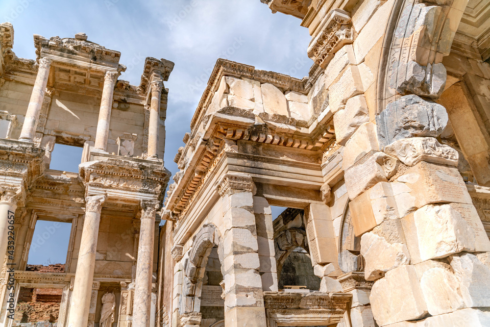 Celsus Library in Ephesus in Selcuk (Izmir), Turkey. Marble statue is Sophia, Goddess of Wisdom, at the Celcus Library at Ephesus, Turkey. The ruins of the ancient antique city. Celsus Library in Ephesus in Selcuk (Izmir), Turkey. Marble statue is Sophia, Goddess of Wisdom, at the Celcus Library at Ephesus, Turkey. The ruins of the ancient antique city.