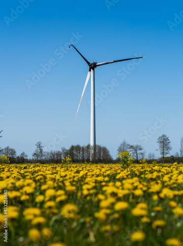 Wind mill in summer landscape with turbine burnt down by fire accident © blumbaker